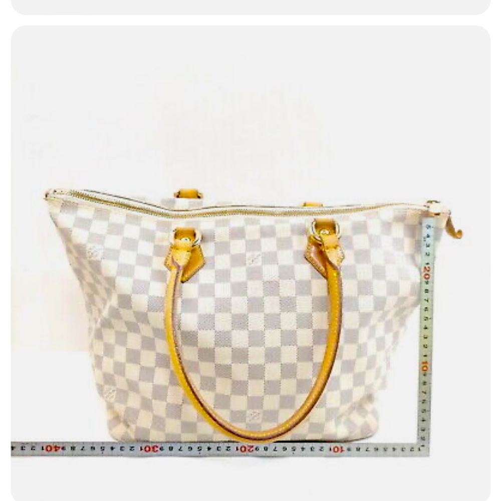 Louis Vuitton Saleya MM Preowned and looks great!  The size & style is timeless.